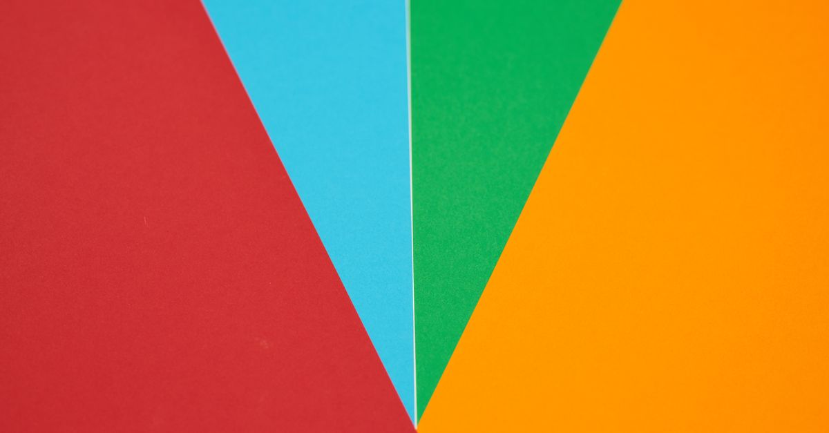 Colorful abstract design featuring red, blue, green, and orange geometric shapes.
